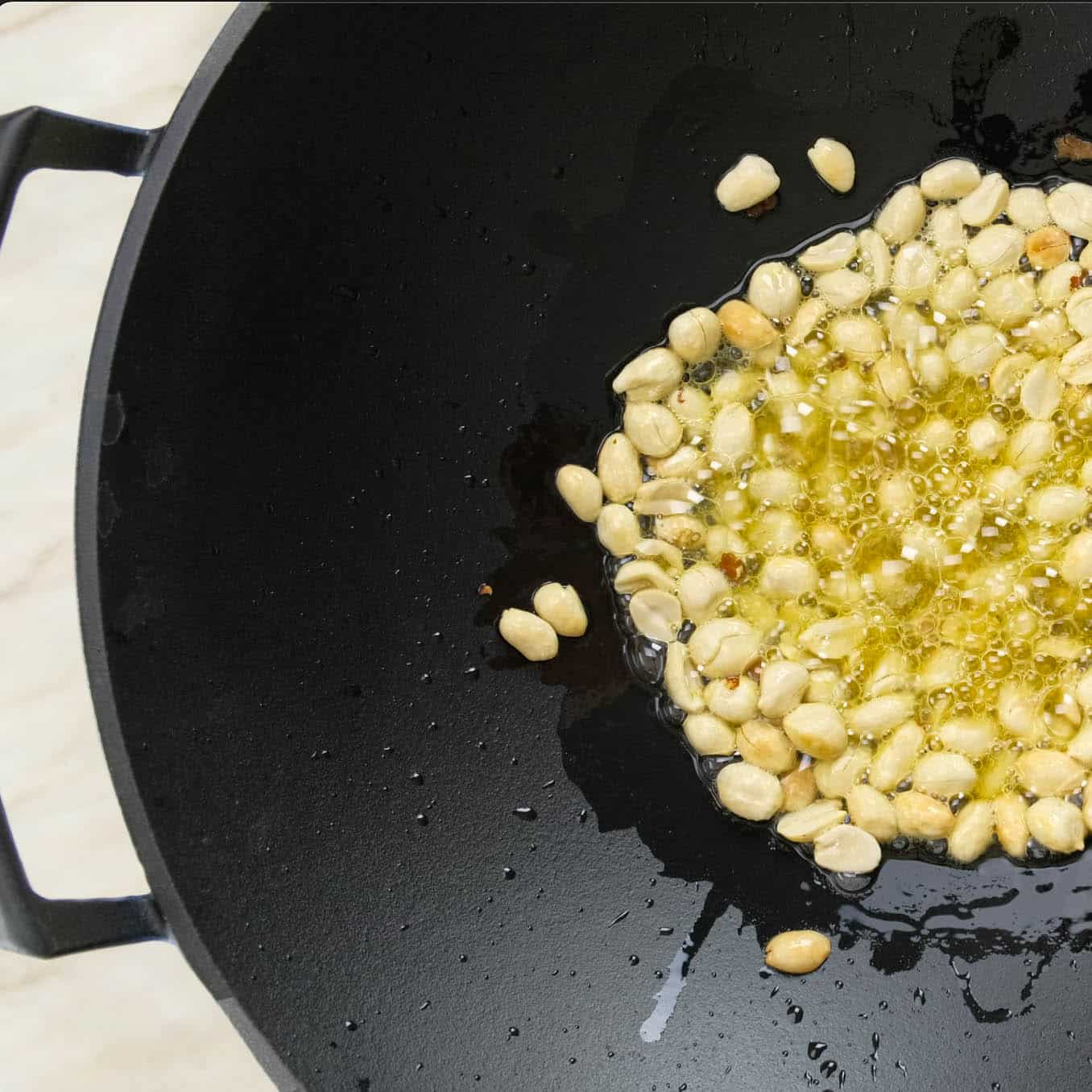 TOASTING PEANUTS FOR VEGETABLE KUNG PAO