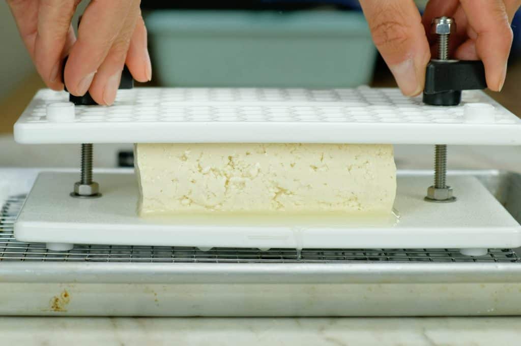 PRESSING TOFU