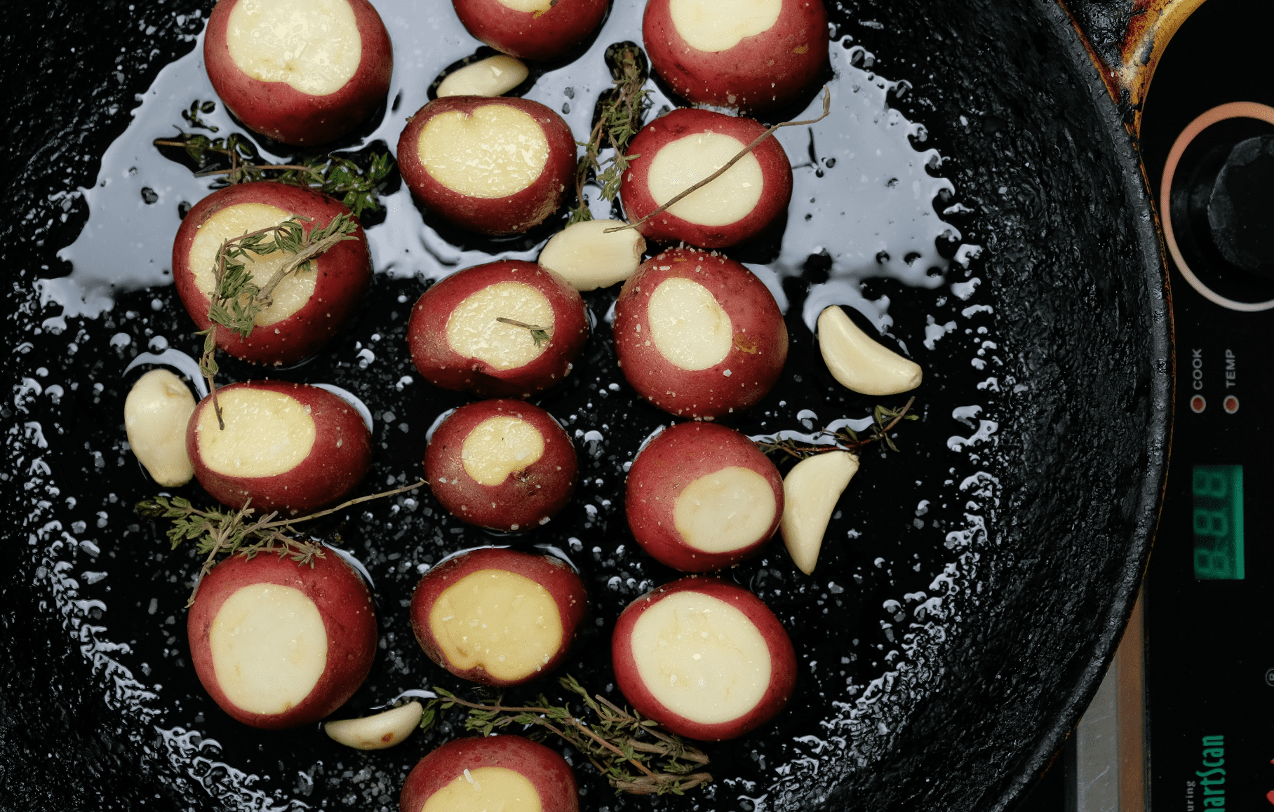 ROASTING RED BABY POTATOES WITH GARLIC AND THYME
