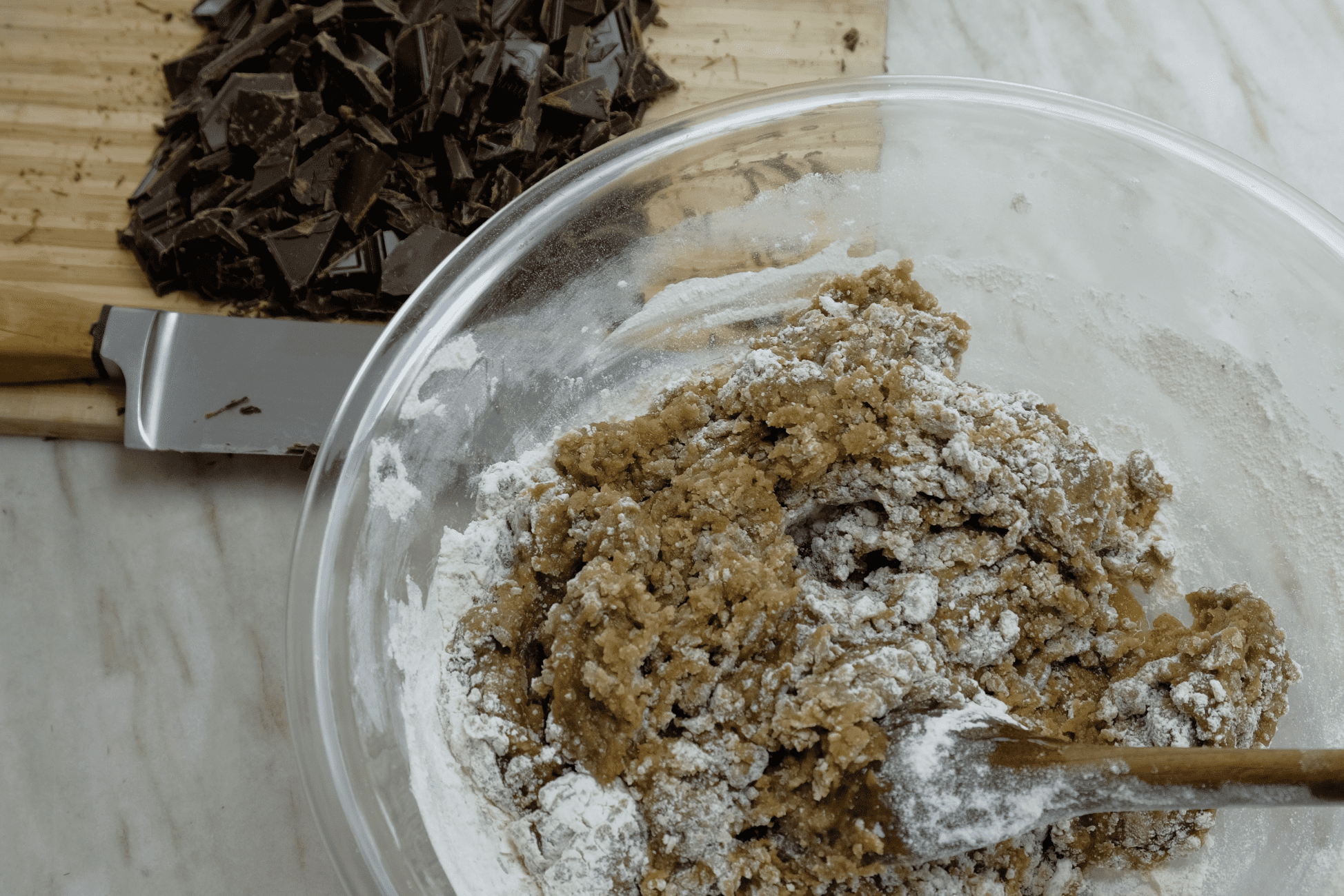 MIXING FLOUR AND SUGAR FOR TOFFEE CHOCOLATE COOKIES
