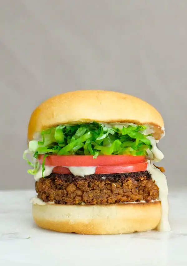 vegan lentil burger, vegan mayo, lettuce, tomato