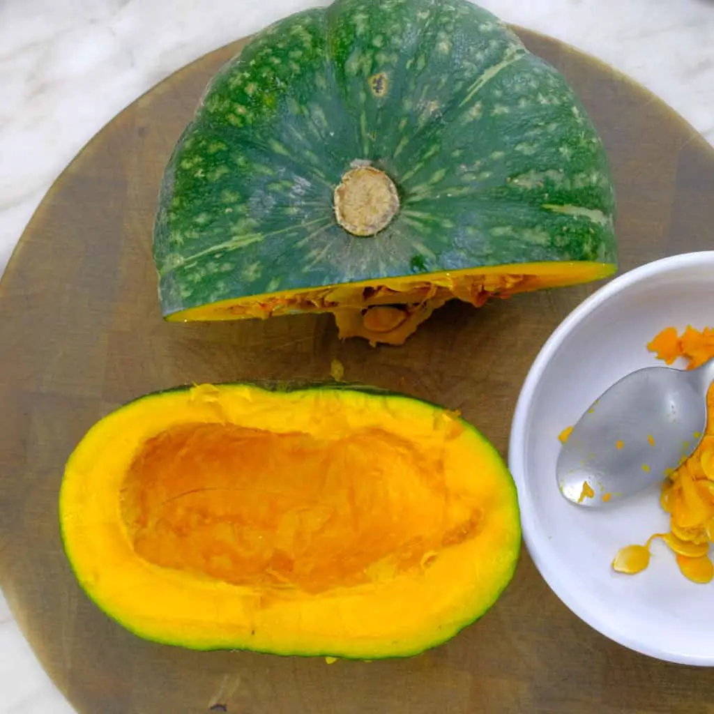 Cut kabocha squash with seeds removed for vegan gnocchi