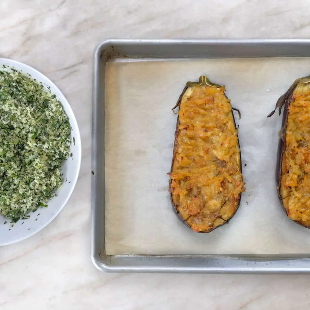 roasted eggplant with garlic confit and a bowl of Thai basil bread crumbs