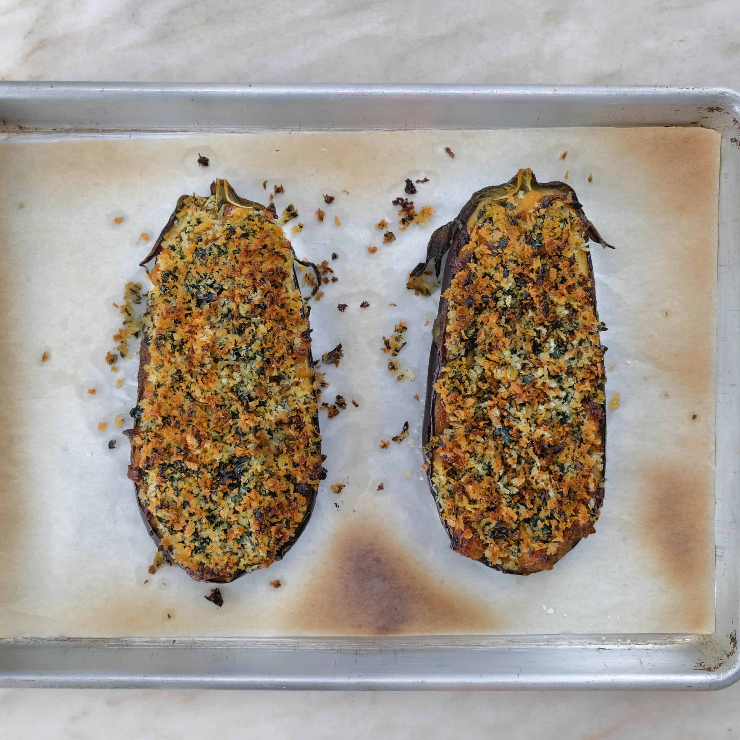 roasted eggplant with garlic confit, toasted Thai Basil bread crumbs
