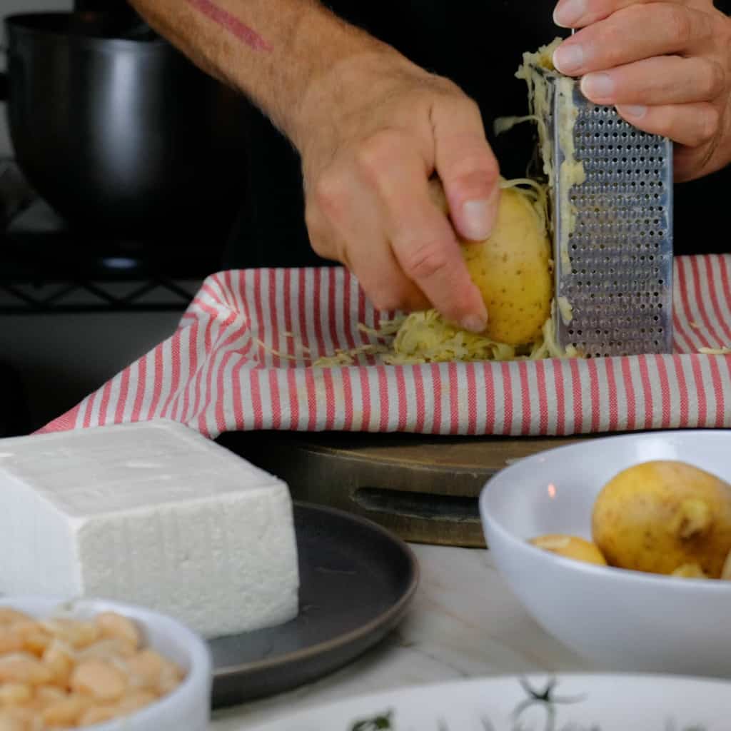 GRATING POTATOES FOR CRISPY POTATO ROSTI_