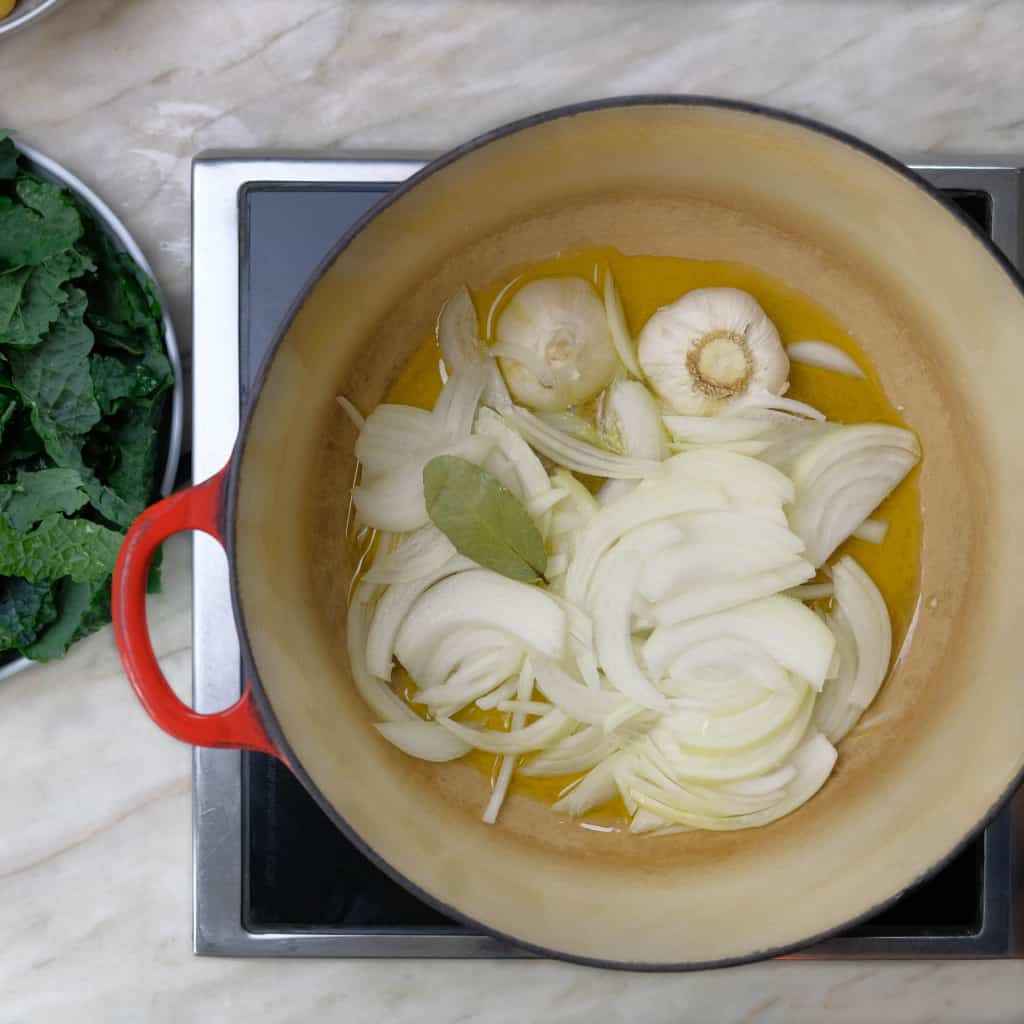 COOKING ONIONS AND GARLIC FOR BRAISED TUSCAN KALE AND BABY DUTCH POTATOES INGREDIENTS_