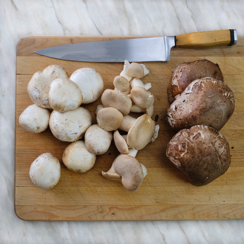 BUTTON MUSHROOMS, TRUMPET MUSHROOMS AND PORTABELLA MUSHROOMS