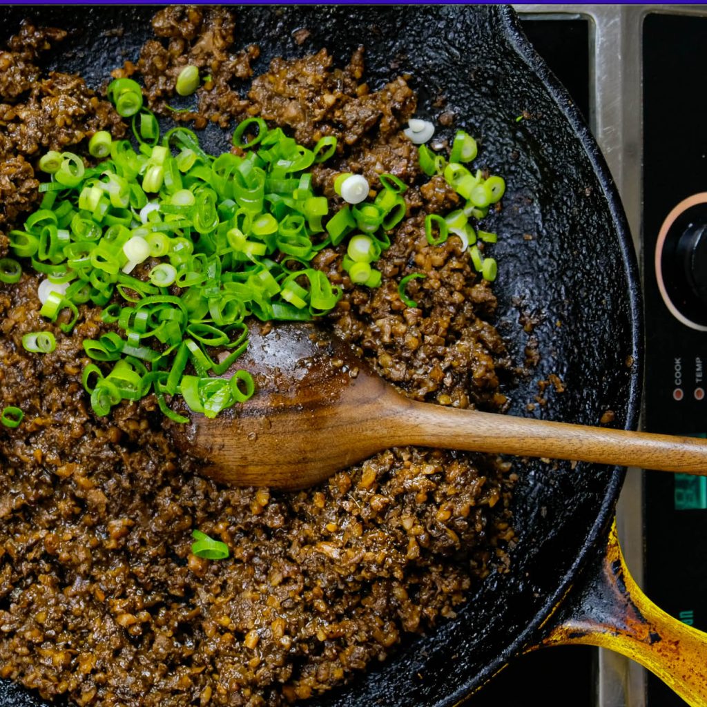 COOKED MUSHROOM WALNUT VEGAN MEAT CRUMBLE WITH SCALLIONS_