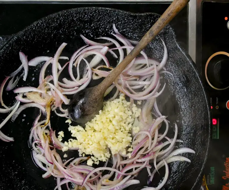 cooking chopped onion and garlic